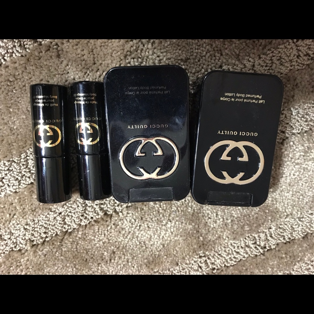 Gucci guilty massage oil and body lotion